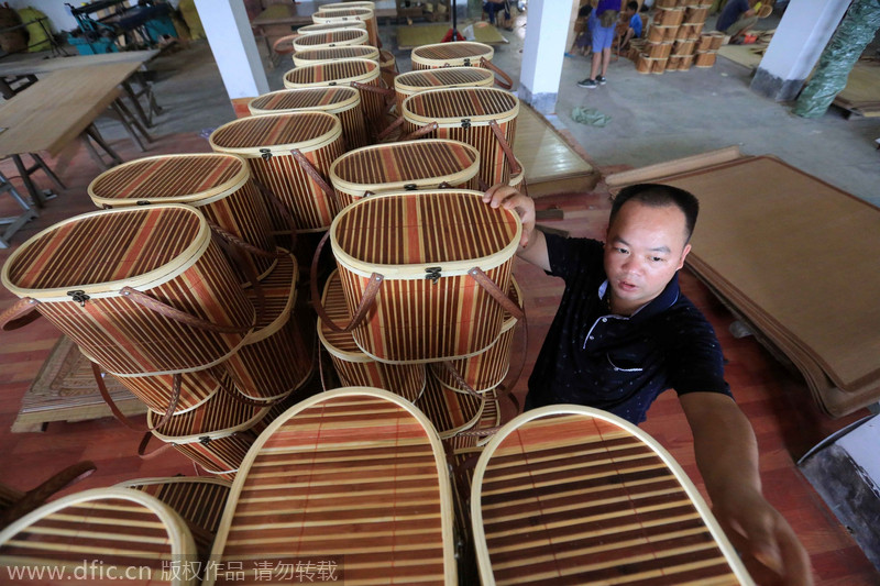 Mantener la calidad en las producciones es uno de los objetivos principales. Rongan, Liuzhou, Guangxi Zhuang. 18 de agosto de 2014. [Foto/IC]